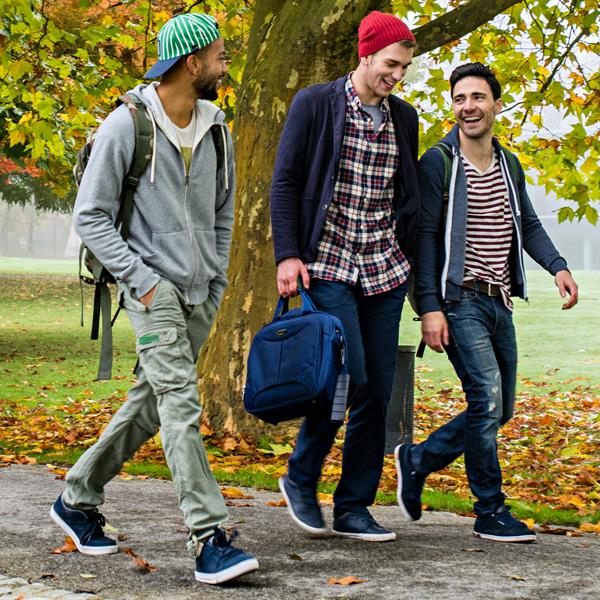 Students walking on campus in the Fall