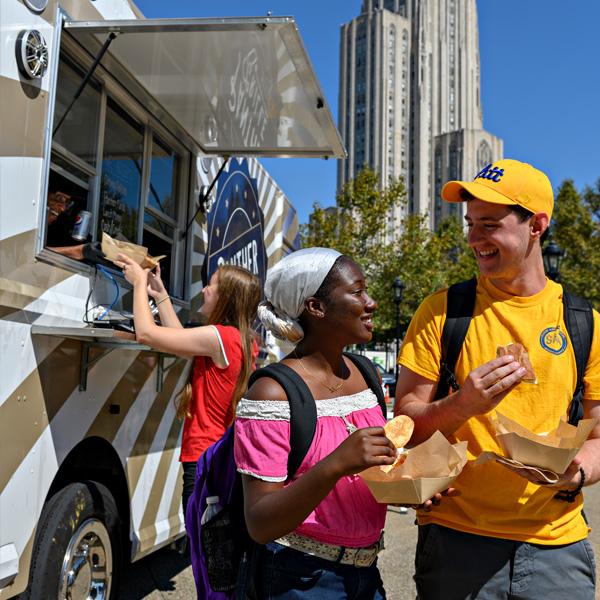 Students standing at Food Truck