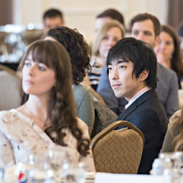 Students at conference tables