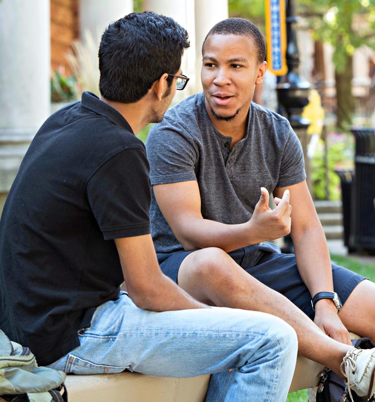 Students talking on campus.