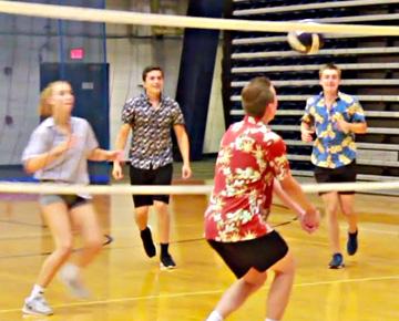 Students playing volleyball