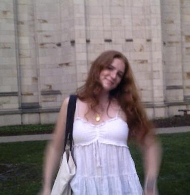 Girl in white dress smiling