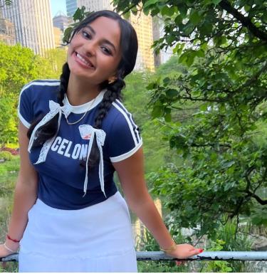Young woman smiling outdoors