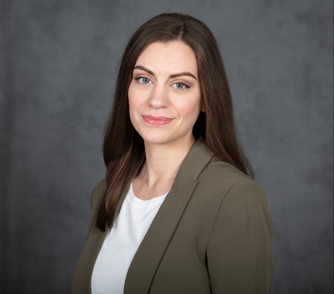 women in green blazer